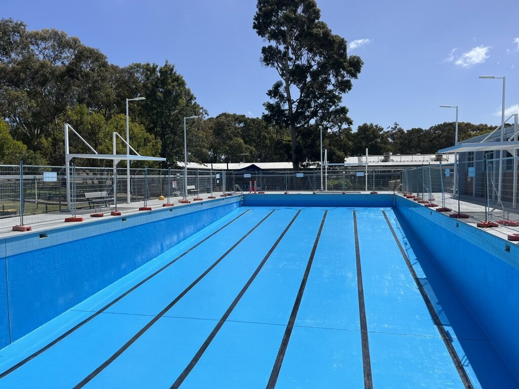 Completed commercial lap pool with lane markers