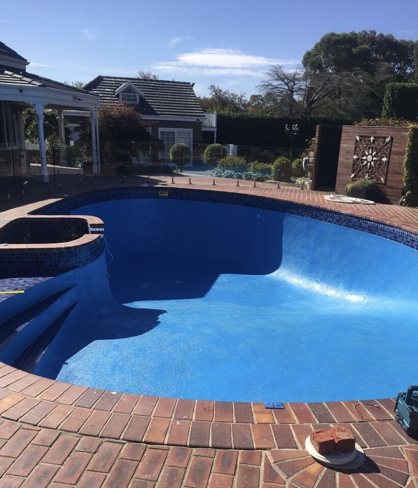 Same pool freshly finished with vivid blue epoxy coating