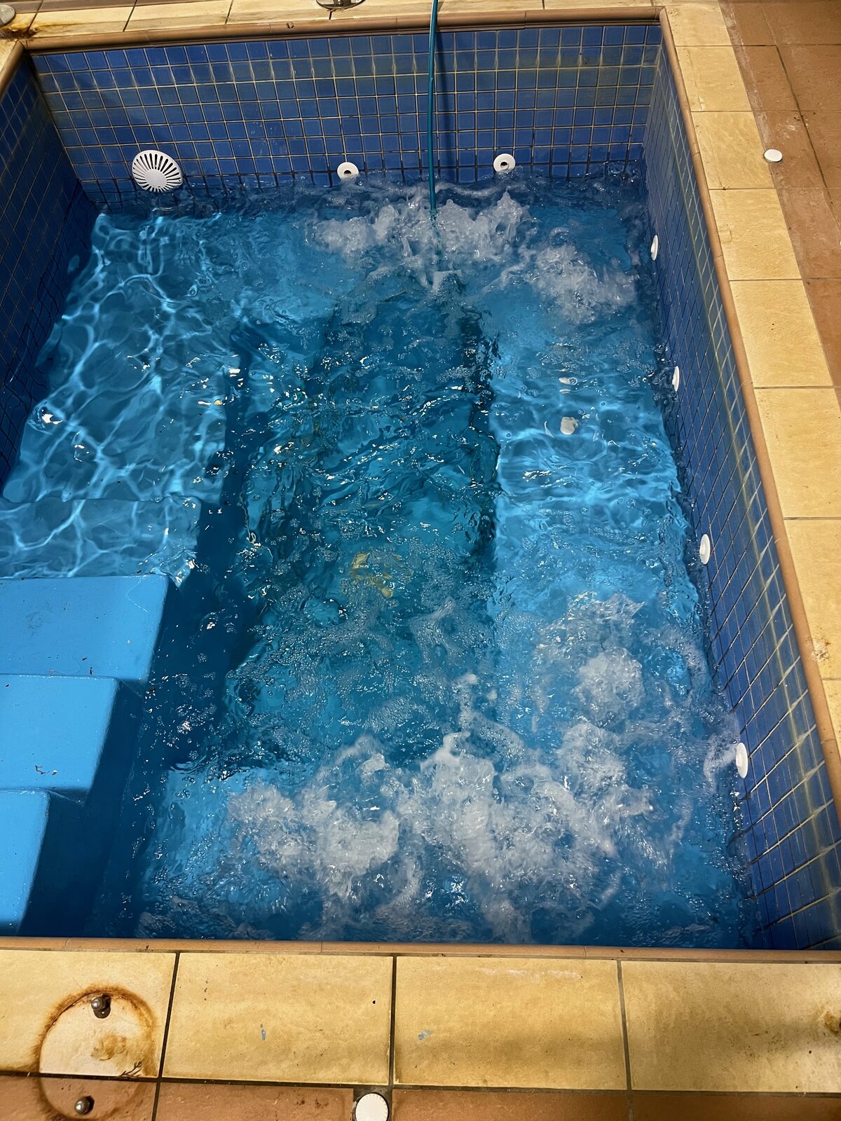 Finished tiled spa with jets running